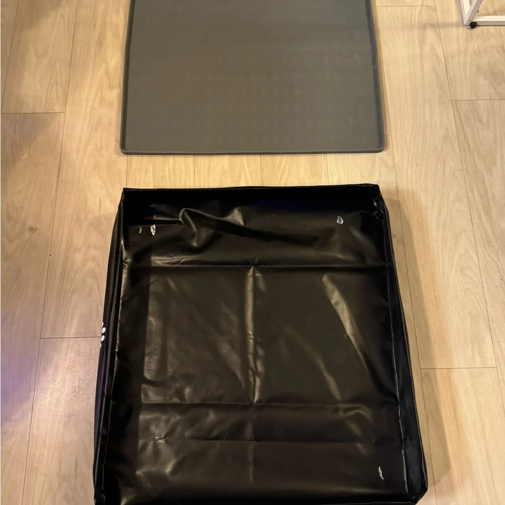 Dog potty pad holders trays bundle. One is black and one is gray.
